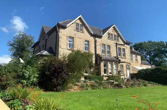 Alba Rose - An outside view of the home