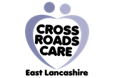 Crossroads in East Lancashire - A company logo